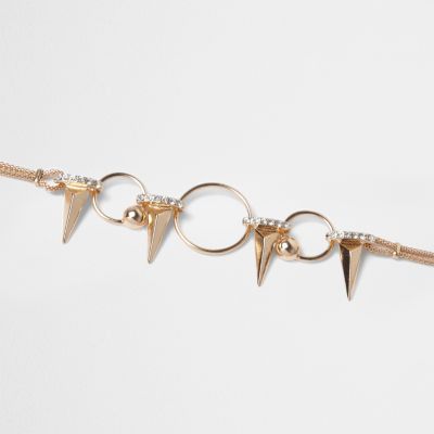 Gold tone spike layer necklace
